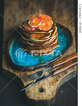 Pancakes with honey and bloody orange slices on Pancakes with honey and bloody orange slices on 29041671