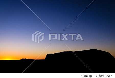 Sunset silhouette of Uluru and Kata Tjuta 29041787