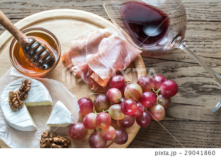 Camembert cheese with glass of red wine 29041860