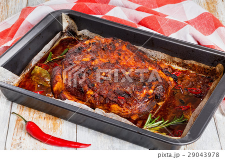 Pork shoulder grilled in roasting pan Pork shoulder grilled in roasting pan 29043978