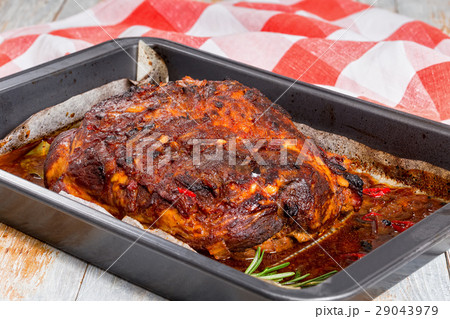 Pork shoulder grilled in roasting pan Pork shoulder grilled in roasting pan 29043979