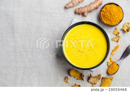 Turmeric drink, latte, tea, milk with cinnamon. Turmeric drink, latte, tea, milk with cinnamon. 29050468