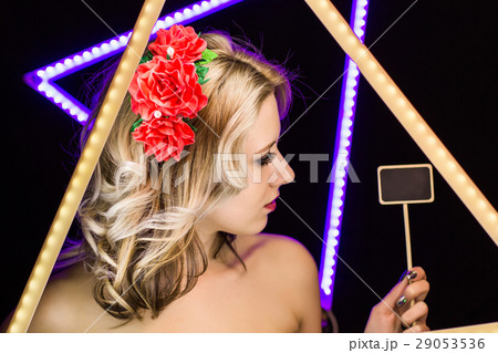 Woman with blond curls and stacking rim close-up 29053536