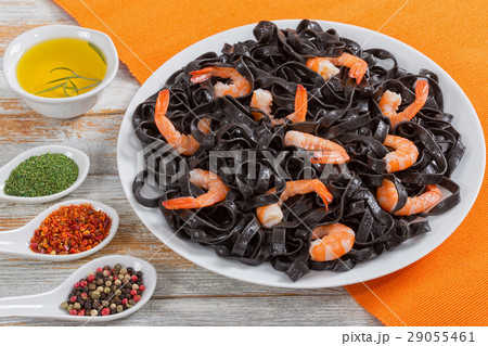 delicious Cuttlefish ink pasta with prawns 29055461