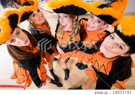 Costumed girls with tricorns from carnival club  29055791