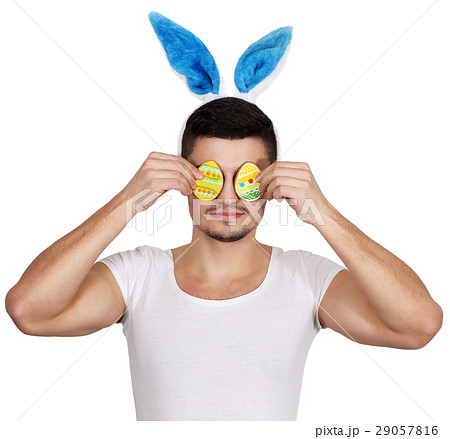 man holds two cookies 29057816