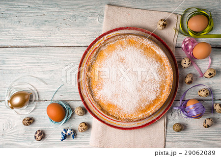 German Easter cake on a ceramic dish and eggs German Easter cake on a ceramic dish and eggs 29062089
