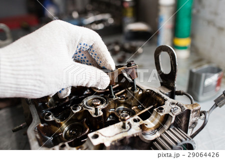 Engine crankshaft, valve cover, pistons. mechanic Engine crankshaft, valve cover, pistons. mechanic 29064426