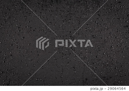 Water drops on dark stone Water drops on dark stone 29064564