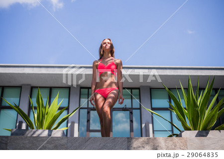 young sexy beautiful woman in pink bikini, posing young sexy beautiful woman in pink bikini, posing 29064835