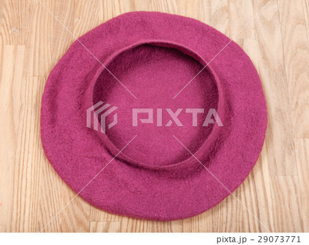 handmade felt beret is forming on wooden table 29073771
