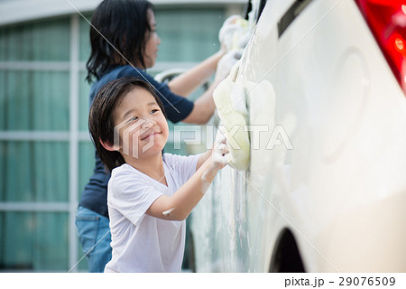 Asian children washing car Asian children washing car 29076509