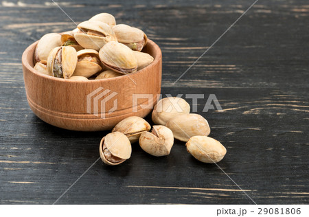 Pistachio nuts in a bowl 29081806
