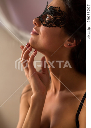 Woman in lace mask. 29083207