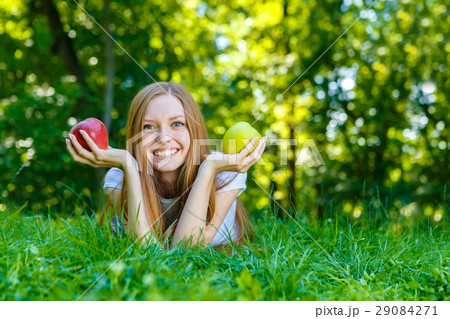 Beautiful smiling red-haired young woman Beautiful smiling red-haired young woman 29084271