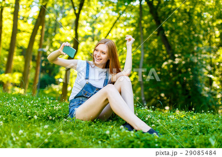 Beautiful smiling red-haired young woman Beautiful smiling red-haired young woman 29085484