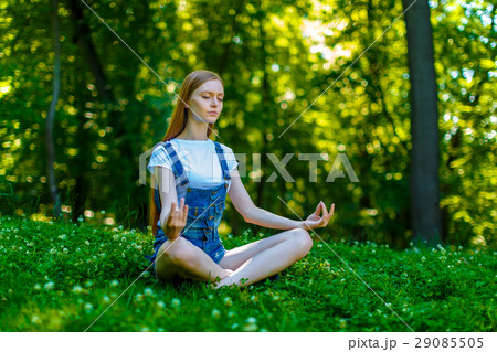 Beautiful smiling red-haired young woman Beautiful smiling red-haired young woman 29085505