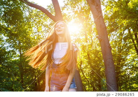 Beautiful smiling red-haired young woman Beautiful smiling red-haired young woman 29086265