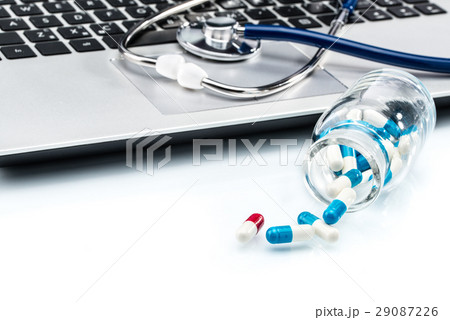 Medical Research, stethoscope  on laptop keyboard 29087226