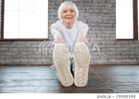 Healthy smiling woman stretching her back 29088368