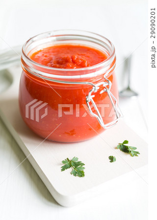 Tomato Sauce In Jar On White Wooden Table 29090201