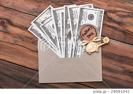 Money near Father's Day card. Money near Father's Day card. 29091042