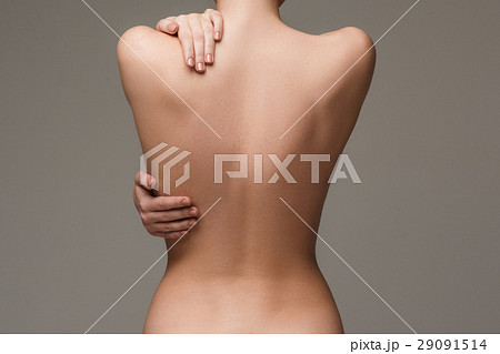 The beautiful woman's body on gray background 29091514