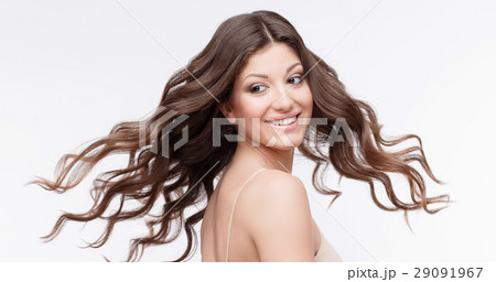 Beautiful Woman with curly brown hair 29091967