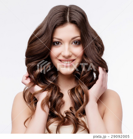 Beautiful Woman with curly brown hair 29092005