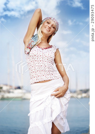 Pretty blond woman during vacation Pretty blond woman during vacation 29093475