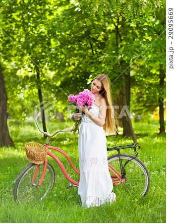 Beautiful blond woman wearing a nice dress Beautiful blond woman wearing a nice dress 29095669