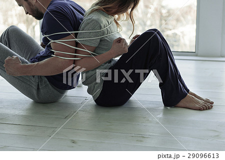 Binding couple sitting in room 29096613