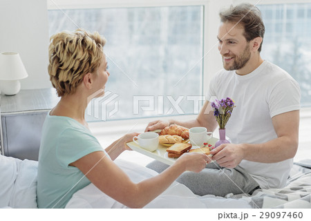 Husband treating his loving woman in bedroom Husband treating his loving woman in bedroom 29097460