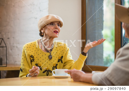 Old woman in cafe. Old woman in cafe. 29097840