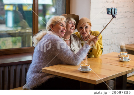 Selfie of ladies in cafe. Selfie of ladies in cafe. 29097889