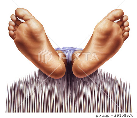 bed of nails with fakir viewed from feet bed of nails with fakir viewed from feet 29108976