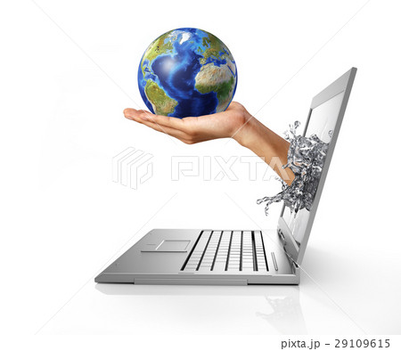 Earth globe on hand palm, splashing out from a laptop computer. 29109615