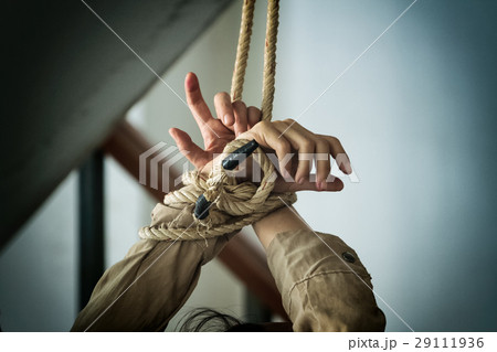 human hands tied up together with rope 29111936