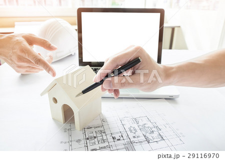 Close-up Of Person's engineer Hand Drawing Plan On Blue Print wi Close-up Of Person's engineer Hand Drawing Plan On Blue Print wi 29116970