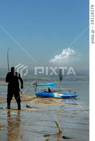 fisherman caught a large carp 29118579