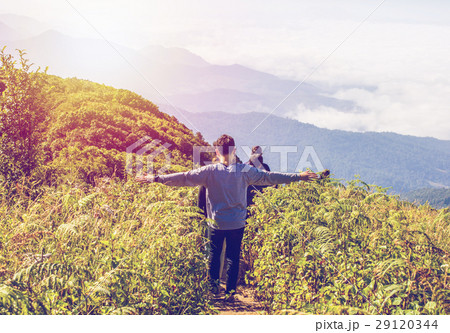 People hiking nature and mountains with Sunset lig 29120344