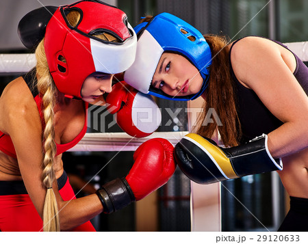 Two boxing women workout in fitness class. 29120633