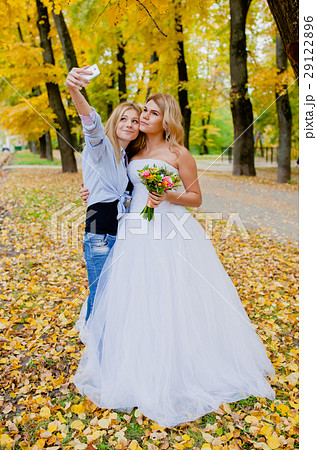 Photographer shooting a selfie with the bride 29122896