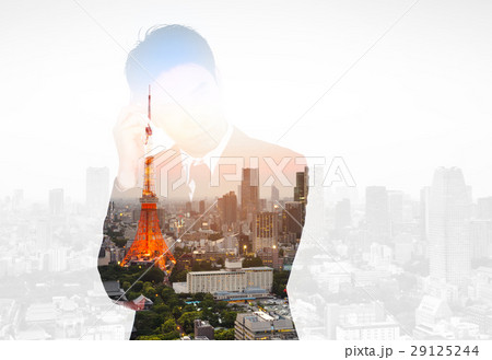 Double exposure of business man thinking against city Double exposure of business man thinking against city 29125244