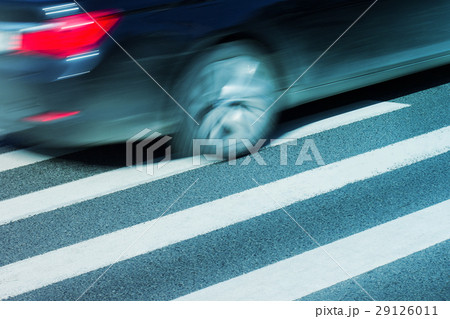 Black car with motion blur on street 29126011