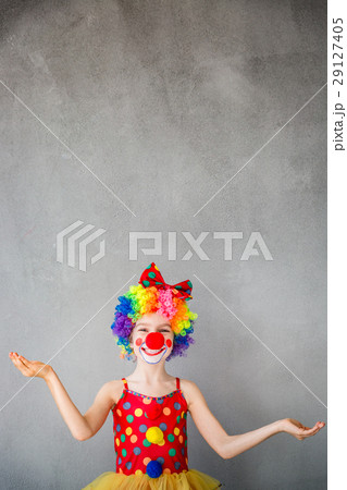 Funny kid clown playing indoor 29127405