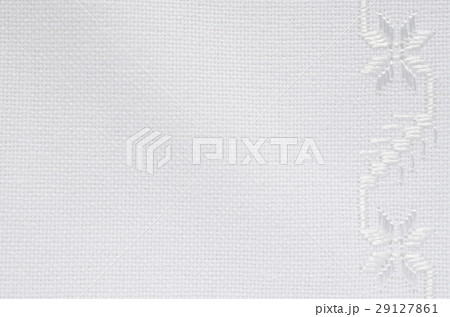 Texture of linen fabric with white silk embroidery Texture of linen fabric with white silk embroidery 29127861