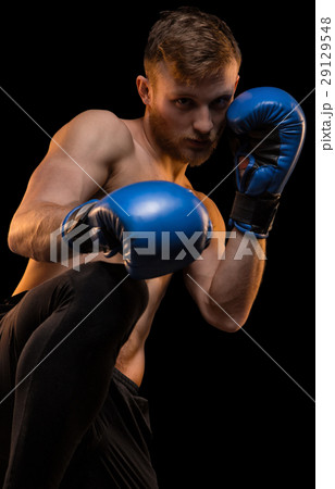 Young man with boxing gloves 29129548