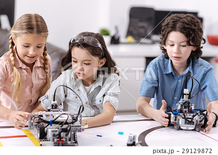 Inventive children testing technologies at school Inventive children testing technologies at school 29129872