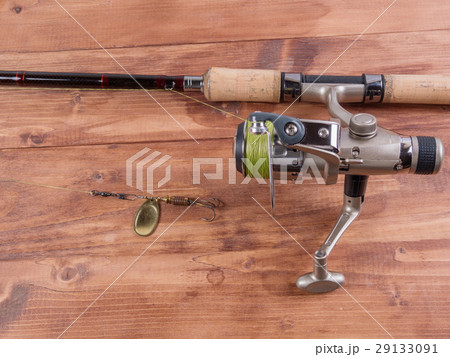 Spinning, baubles on a wooden background. 29133091